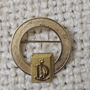 Vintage Karatclad 12 KGE Anson Goldtone Circle Brooch with Monogram "D" Design
